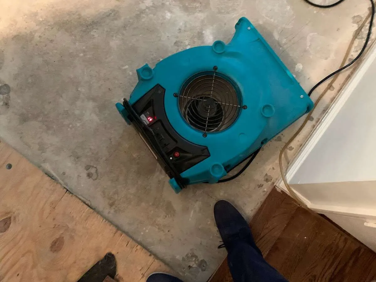 Air mover drying subfloor during Commercial Water Damage Restoration in Homestead Meadows South